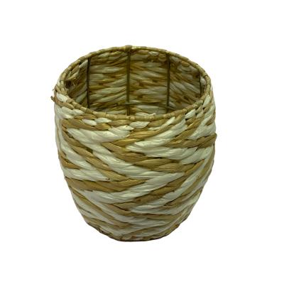 China 100% Sustainable Handwoven Water Hyacinth Storage Basket With Iron Frame Household Clothes Storage Bucket for sale