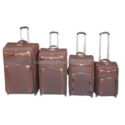 China EVA Brown With Popular Leather With Button 4 Pcs Set Satin Lining Durable 2 els Metal Logo Luggage Bag for sale