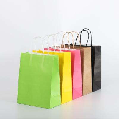 China Cheap Recyclable Cosmetic Natural Kraft Natural Hand Shopping Kraft Paper Bag For Promotional And Gift for sale