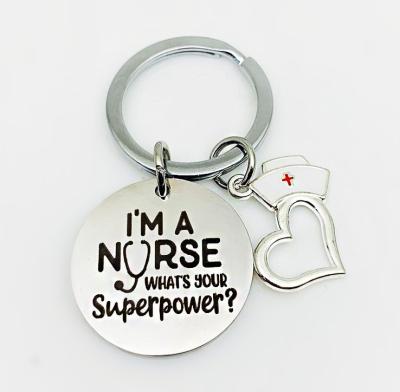 China Metal I'm A Nurse What's Your Dinner Power Keychain Nurse Gift Nurse Hat Charm Stainless Steel Key Chain for sale