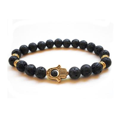 China Natural Stone Hand Charm Lava Stone Hamsa Beaded Bracelet for sale