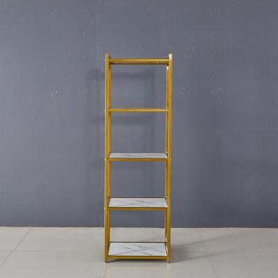 China Durable Store Lady Retail Store Fitting Rack Clothes Show Golden Garment Display Clothing Rack for sale