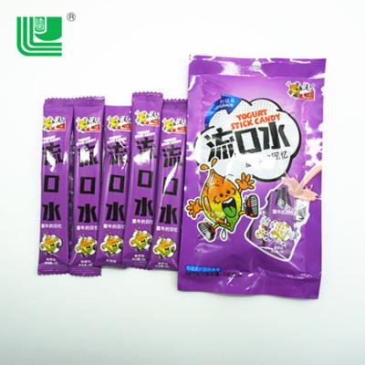 China Natural Free Sample Sweet Stick Confectionery Grapes Milk Candy for sale