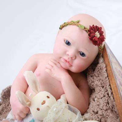 China Lovely Cartoon Toy 18inch Reborn Baby - Soft Silicone Doll Toddler Toddler Toy With Flower Hair Ornament For Kids Christmas Gifts for sale