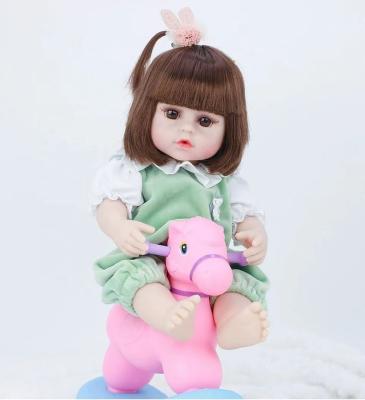 China Toy Real Alive 16Inch Cartoon Reborn Baby Toddler Soft Face Girls Toys Doll Riding A Horse Birthday Christmas Gift for sale