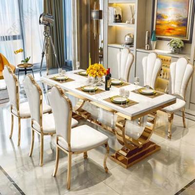 China Fanxi factory stainless steel dining table set 8 chairs dining room furniture dining table set for 8 seater gold metal dining tables for sale