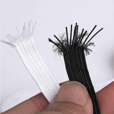 China Hot Selling Wholesale Custom Polyester 6mm Elastic 1/4 Inch Flat Seam Black White Elastic Band For Garment for sale