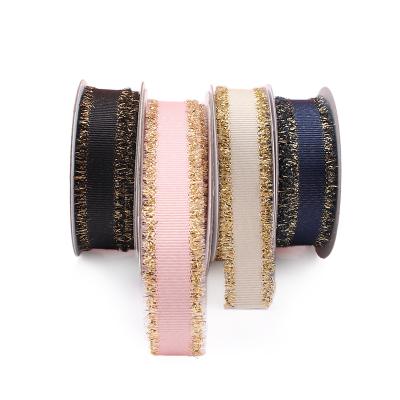 China 15mm 20mm 25mm luxury gold grosgrain glitter fringe stock viable ribbon for garment for sale