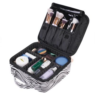 China Fashion Zebra Pattern Travel Organizer Portable Cosmetic Bag Artist Beauty Make Up Case for sale