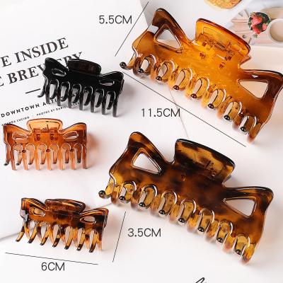 China Newest Fashion Leopard Acetate Geometric Hair Claw Clip Hair Accessories Wholesale Oversized Claw Clip For Women for sale