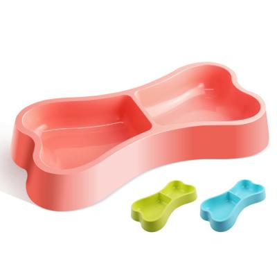 China Viable Manufacturer Pet Supplies Candy Color Bone Eating and Drinking Dual Function Bowl with Double Pet Bowl Food Basin for sale