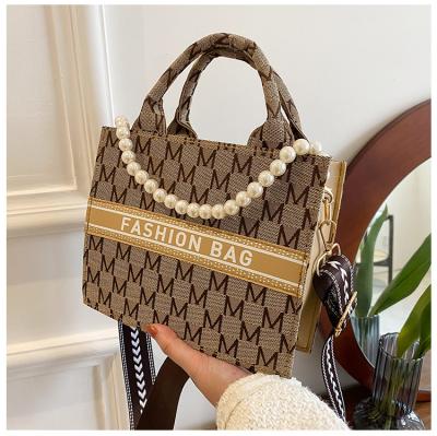 China Fashion Women's Bag 2022 Fashion Print Pearl Handbag Ladies Shoulder Tote Bags Women Messenger Bags for sale