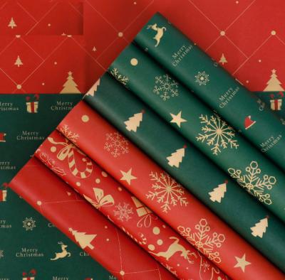 China Disposable Christmas Wrapping Paper Christmas Apple Bouquets Flower Wrapping Paper Christmas Gift Wrapping Paper for sale