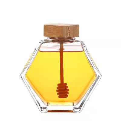 China 380ml Viable Clear 220ml Honey Pot Glass Honey Jar with Wooden Dipper and Cork Lid Cover for Home Kitchen for sale