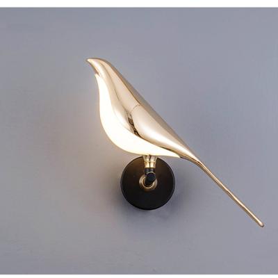 China Luxury creative simple modern bedroom hotel bedside lamp living room TV background wall lamp magpie shape wall light led lights for sale