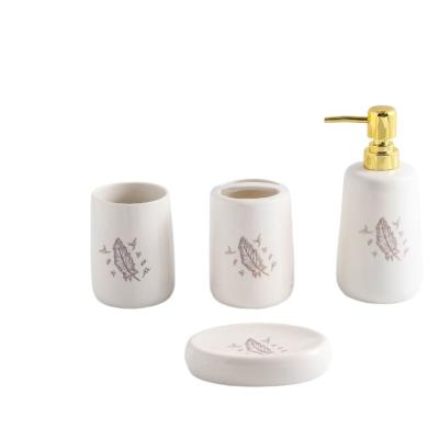 China Wholesale Customized Sustainable Hotel 4Pcs Simple Pattern Design Ceramic Accessory Home Bathroom Set In White for sale