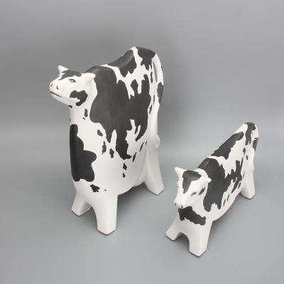 China OT002 Minimalist Ceramic Cow Sets Ornaments Animal Porcelain Cow Black And White Home Decor for sale