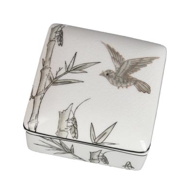 China Small Classic Ceramic Ceramic Candy Box White Bird Gift Box Ashtray With Lid Home Decoration for sale