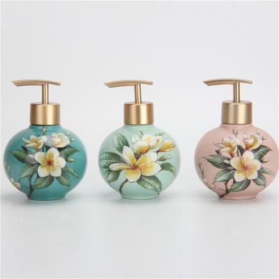 China Sustainable Luxury Ceramic Airless Round Flower Bottle Shampoo Bottle BR005 Lotion Bottle Handpainting Pump for sale