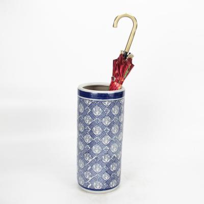 China Old Fashion Store Antique Chinese Blue Roller Stand Outdoor Ceramic Blue Umbrella Stand for sale