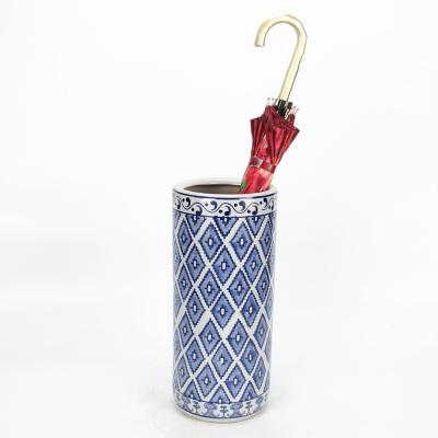 China Asia Shop Old Fashion Antique Blue Roller Stand Indoor Ceramic Blue Umbrella Stand for sale