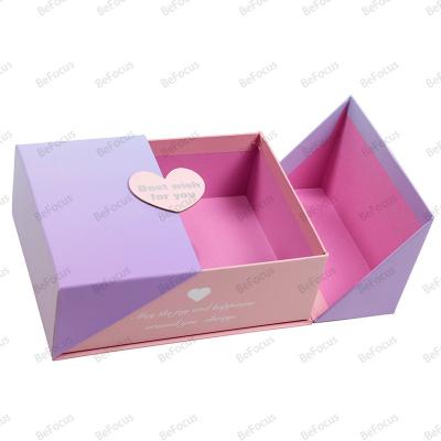 China Recycled Materials Luxury custom magnetic closure rigid cardboard double door open set of makeup full box with cosmetics for sale