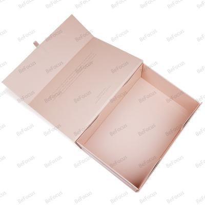 China Recycled Materials Wholesale price high-end customized pink color magnetic book shape cardboard gift foldable box for gift packaging with logo for sale