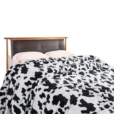 China Wholesale Lightweight Black And White Plush Fire Retardant Fuzzy Flannel Fleece Warm Jiaohui Cow Printing Blankets For Sofa Bed for sale