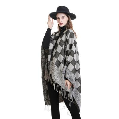 China Poncho Gift Autumn And Winter Shawl New Outside Travel Keep Warm Poncho Fashion Plaid Simple Shawl Cape With Tassel For Women for sale