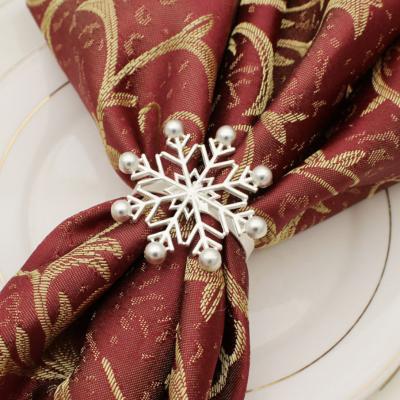 China Factory direct new viable hotel style christmas napkin buckle silver metal western napkin ring for sale