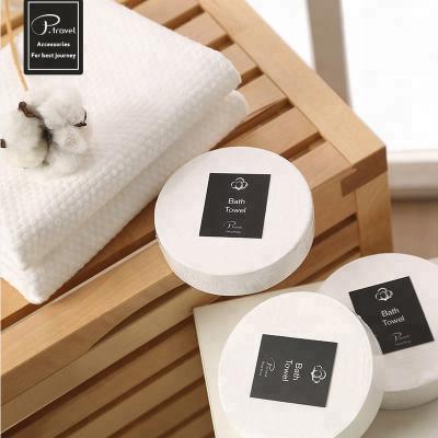 China P.Travel Compressed Vacuum Packed Round Pressed Disposable Travel Towels Super Magic Cleaning Compressed Towel for sale