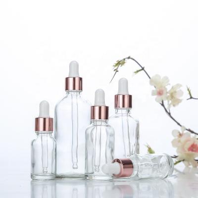 China Factory Wholesale Cosmetic Rose Gold Essential Oil Bottle Dropper Essence Bottle Glass Rollball Dispensing Small Sample Bottle for sale