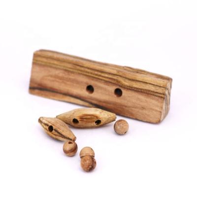 China Oud Merauke Agarwood or Oud Merauke Agarwood/eaglewood head jewelry from Solid Maufacture custom direct wood material making charms for sale