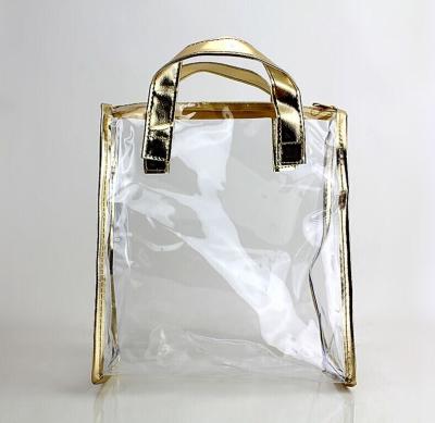 China PVC Tote Clear Plastic Bag Golden Color Package Cosmetics Fragrance for sale