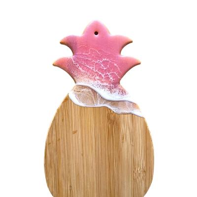 China Sustainable Pineapple Shaped Bamboo Resin Epoxy Cutting Board Plate for sale