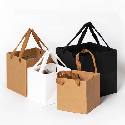 China Hot Selling Disposable Kraft Paper Black White Red Brown Shopping Bag With Flat Handle for sale