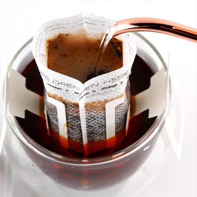 China Hot Sale Eco-friendly Disposable Portable Ear Drip Coffee Filter Paper Stocked Hanging Bag For Filter Coffee Tea Moving Tools for sale