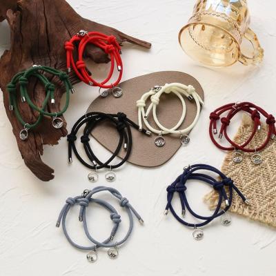 China Free Sample CLASSIC Friendship Couples Magnetic Family Bracelet Rope Adjustable Waterproof Handmade Relationships Bracelets for sale