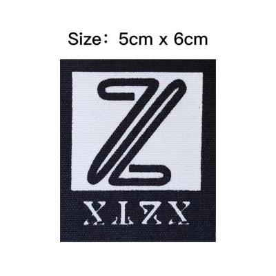 China Durable Labels Plates Labels For Brand Logo Custom Metal Bags Clothing Zinc Alloy Top Engraved 2 Hole Shoes Western OEM Customized Fade for sale