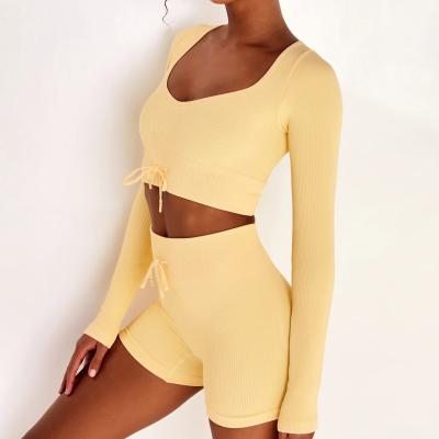 China New Breathable Women Seamless Ribbed Candy Colors Yoga Set Long Sleeve Crop Top Biker Shorts Gym Fitness Set for sale