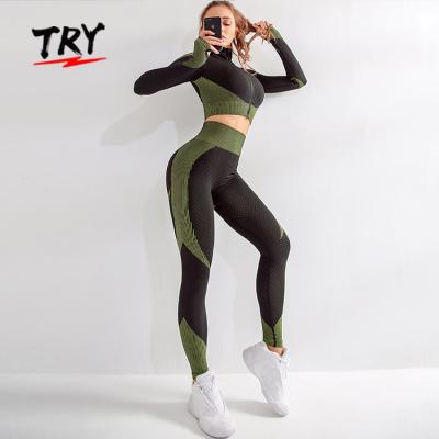 China TZ888 Antibacterial Womens Long Sleeve Zipper Crop Top And Gym Leggings Yoga Set Seamless Mesh Yoga Set for sale