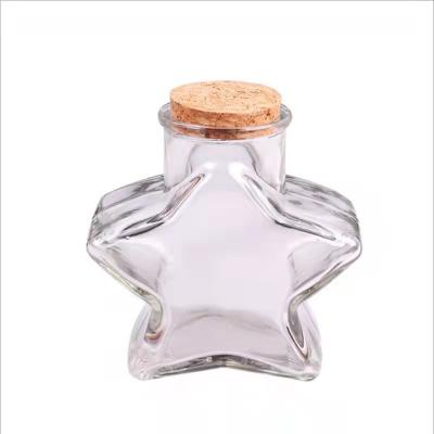 China Star Shaped Glass Jars Favor Tiny Empty Tiny Bottle Jars with Cork Lids for Origami Paper Stars for sale