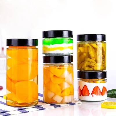 China Sealed lid 100 200 300 400 500 grams straight glass jar for strawberry jams and honey for sale