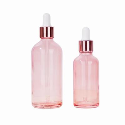 China Leakingproof Design Rose Essential Oil Glass Dropper Bottle For Essential Oils Fragrance Aromatherapy for sale