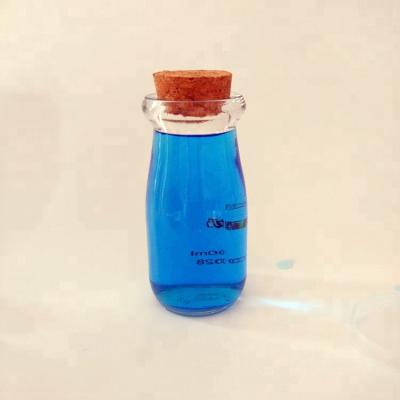 China 100ML CANDY Empty Milk Bottle Shaped Corked Glass Bottles For Candy Spice And Herbs for sale