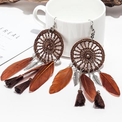 China New Retro Wild Woven Feather Earrings HipHop Earrings Ladies Fashion Earrings Wholesale for sale