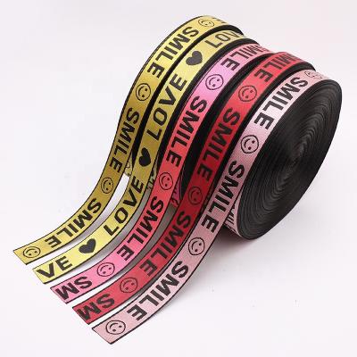 China Custom high tenacity logo rattan webbing roll printed webbing band jacquard ethnic woven webbing for sale