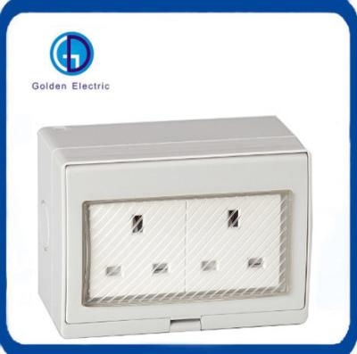 China 110V-250V Waterproof British Type Surface Mounted Switch Socket 13A for Outdoor Lighting for sale