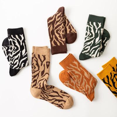 China Winter QUICK DRY cotton zebra prin designer high quality Sporty Midi sock for girls England women thick slouch crew socks high long for sale