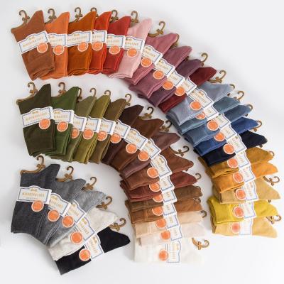 China 40 Colors Solid Cotton Slouch QUICK DRY Women Long Every Day Midi Socks For Girls Candy Soft Thick Standard Crew Socks for sale